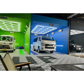 A special space created with honeycomb lights and garage floor tiles.