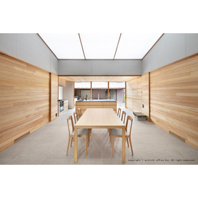 Open interior space created with a light membrane ceiling in a top light style.