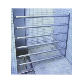 Seismic isolation expansion joint intrusion prevention fence