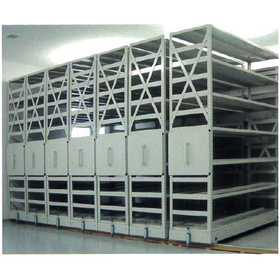Manual mobile shelves (mobile racks) for utilizing warehouse space in printing and publishing.