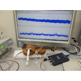 Ultrasonic experiment using a toy violin