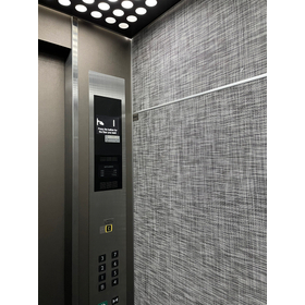 上質な空間を演出『エレベーター内装保護テキスタイルパネル』