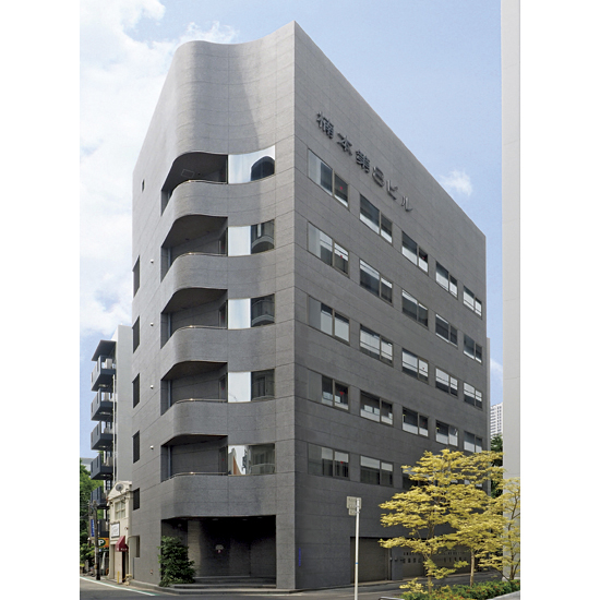 【施工例26】ビル外壁をタイル剥落防止工法＋石材調外装材で改修