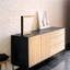 The "Blackbird Sideboard" is characterized by a combination of different materials.