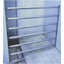 Seismic isolation expansion joint intrusion prevention fence