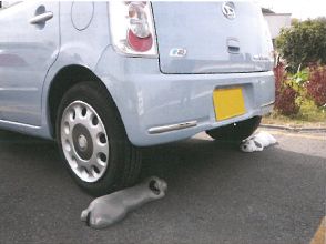 レジンコンクリート製　可愛いワンちゃんの車止め